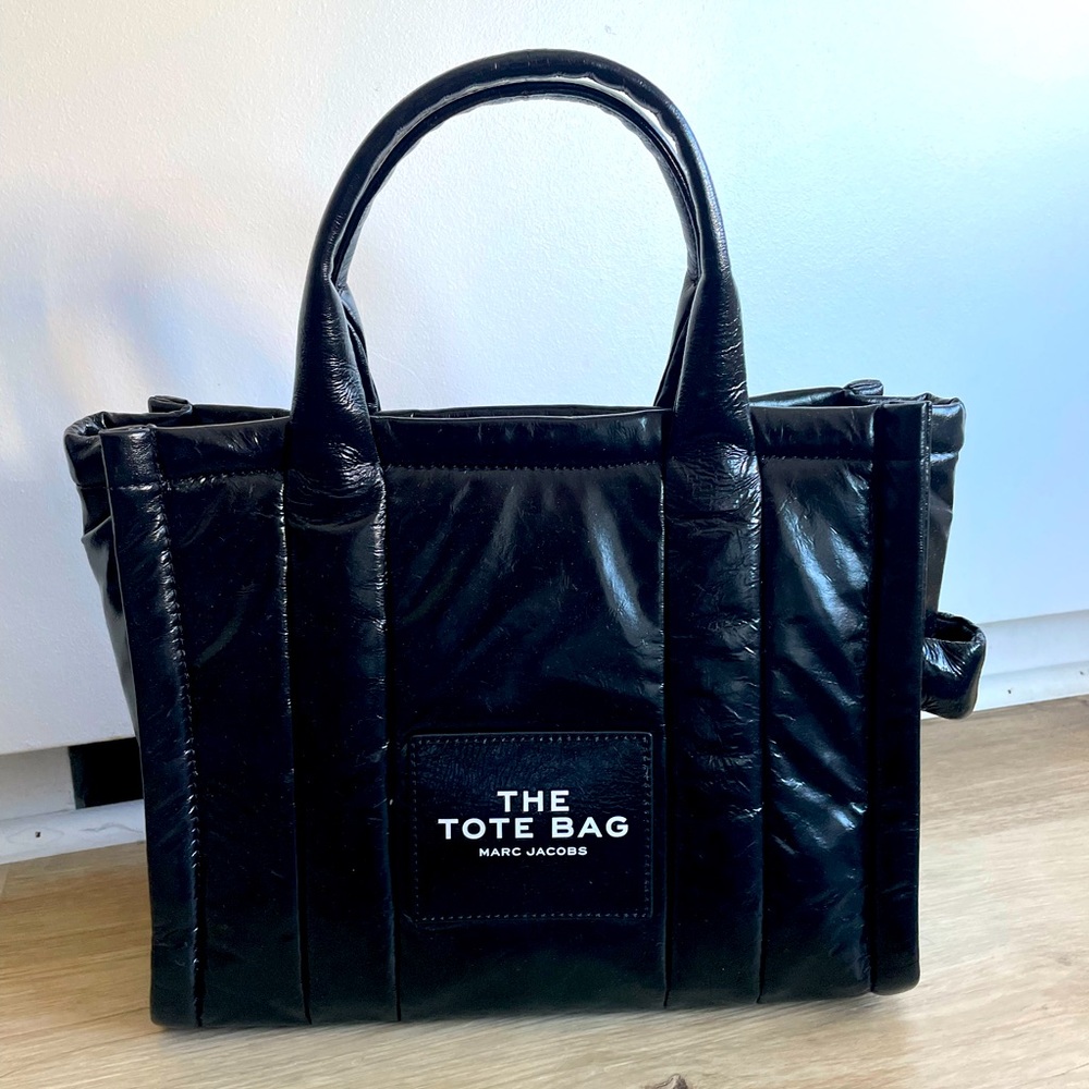 Marc Jacob’s THE TOTE BAG. Black shiny tote with long strap. Brand new tags